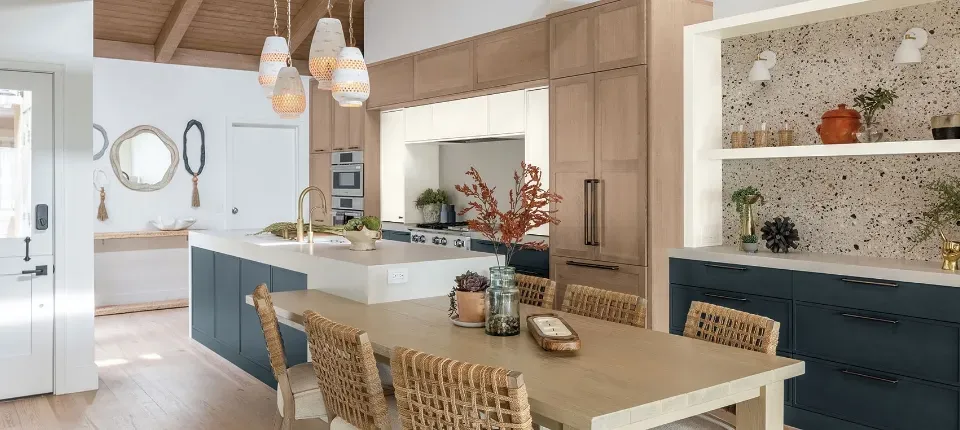 Transitional kitchen blending painted perimeter cabinets with a contrasting wood island