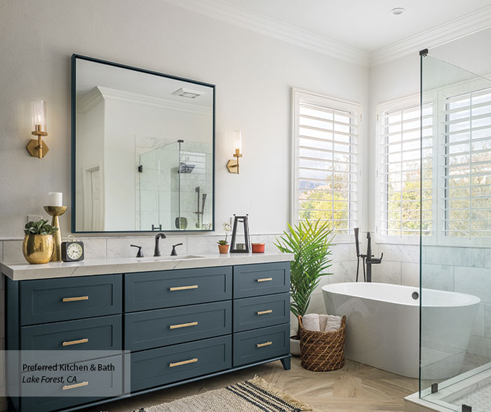 Contemporary gray kitchen cabinets with slab doors and long matte bar pulls