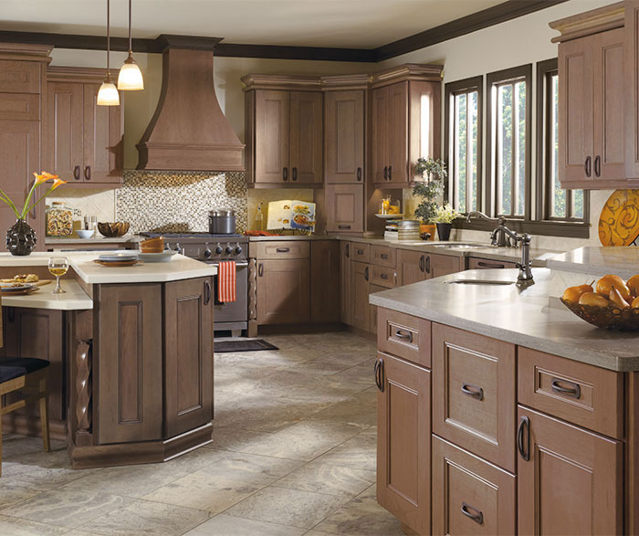Modern white kitchen in Charlottesville with shaker cabinetry, brushed nickel hardware, and quartz countertops